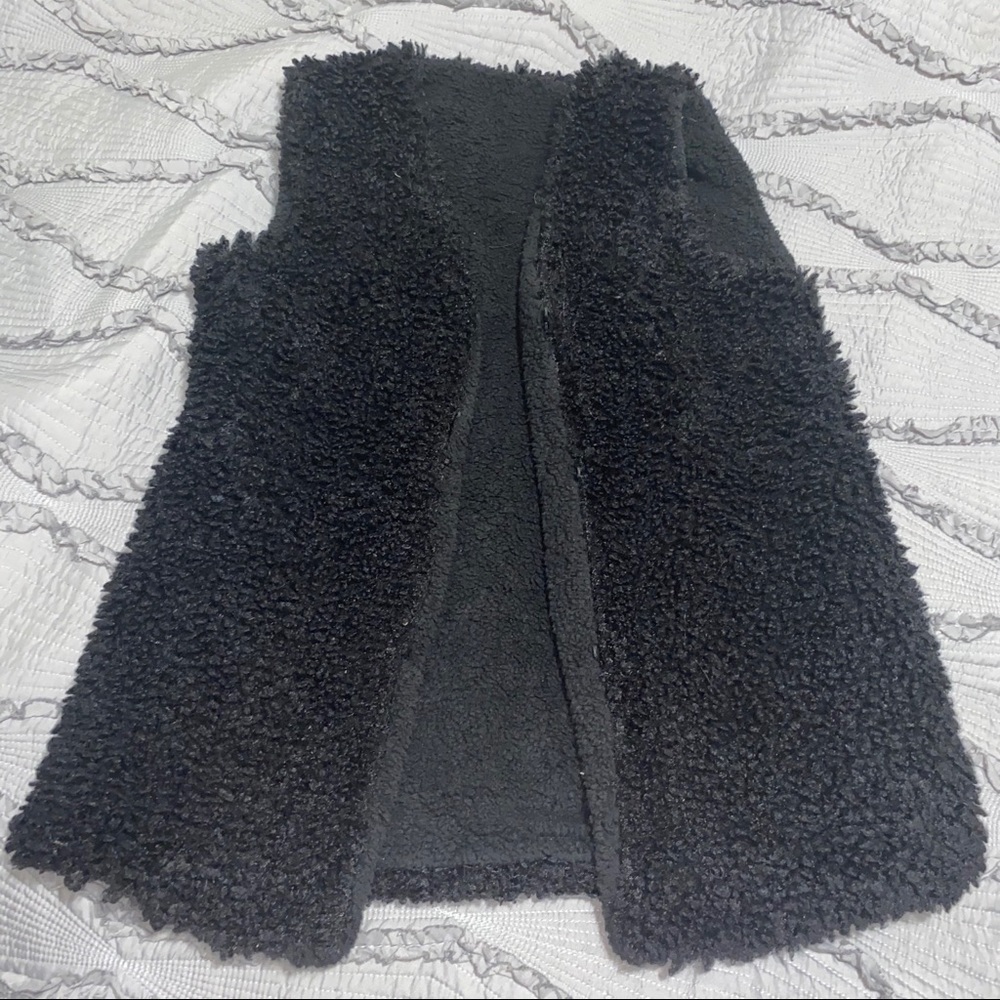 black vest